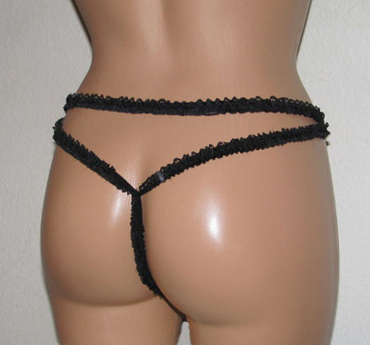 Back view of black lace g-string.